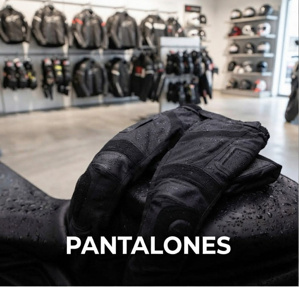 Pantalón para motociclista con protecciones removibles